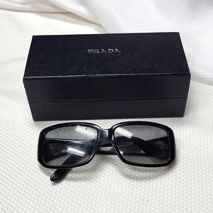 IN SEARCH OF PRADA SUNGLASSES
